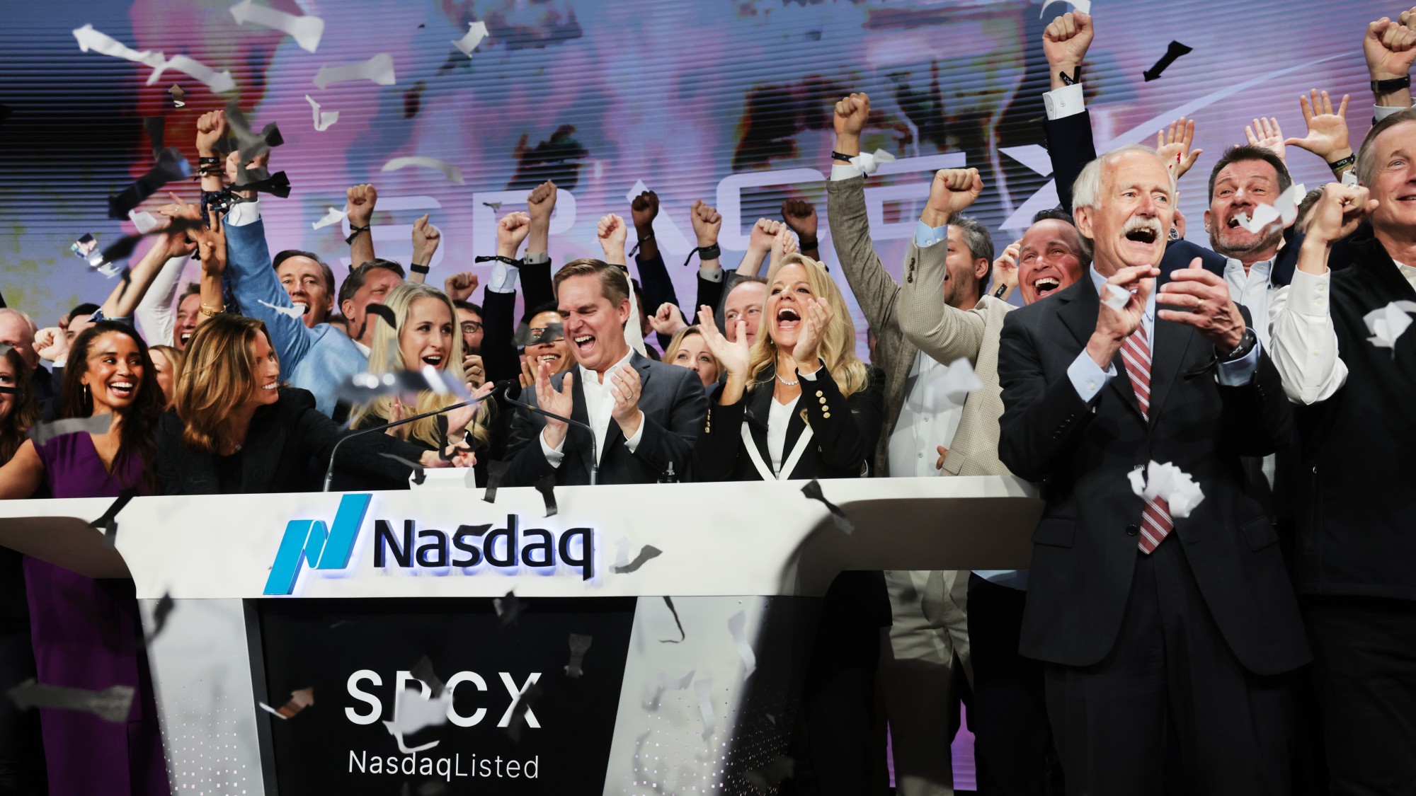 SpaceX staff celebrate public listing