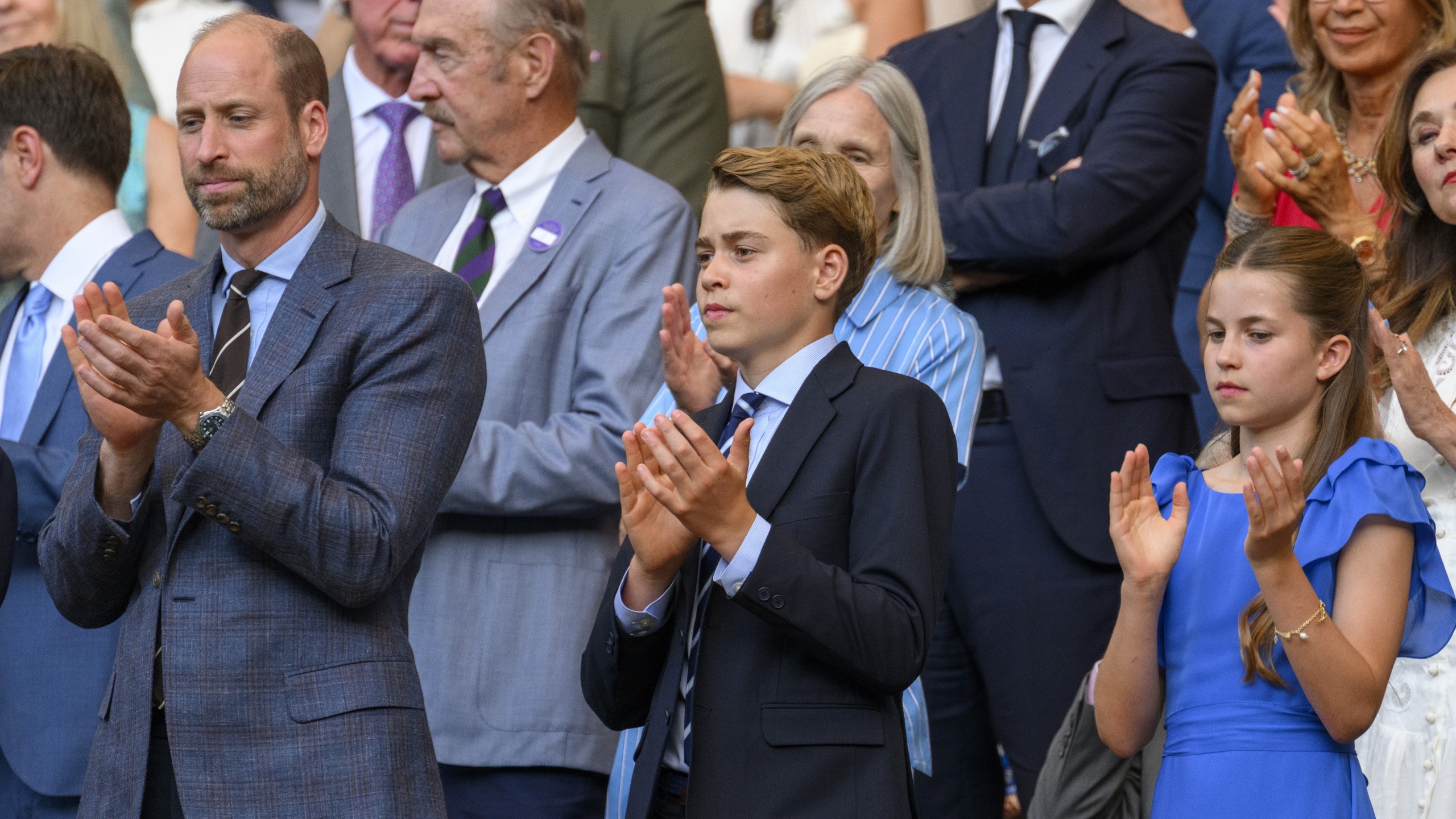 William, Prince of Wales, Prince George and Princess Charlotte watch the men's singles final at Wimbledon 2026