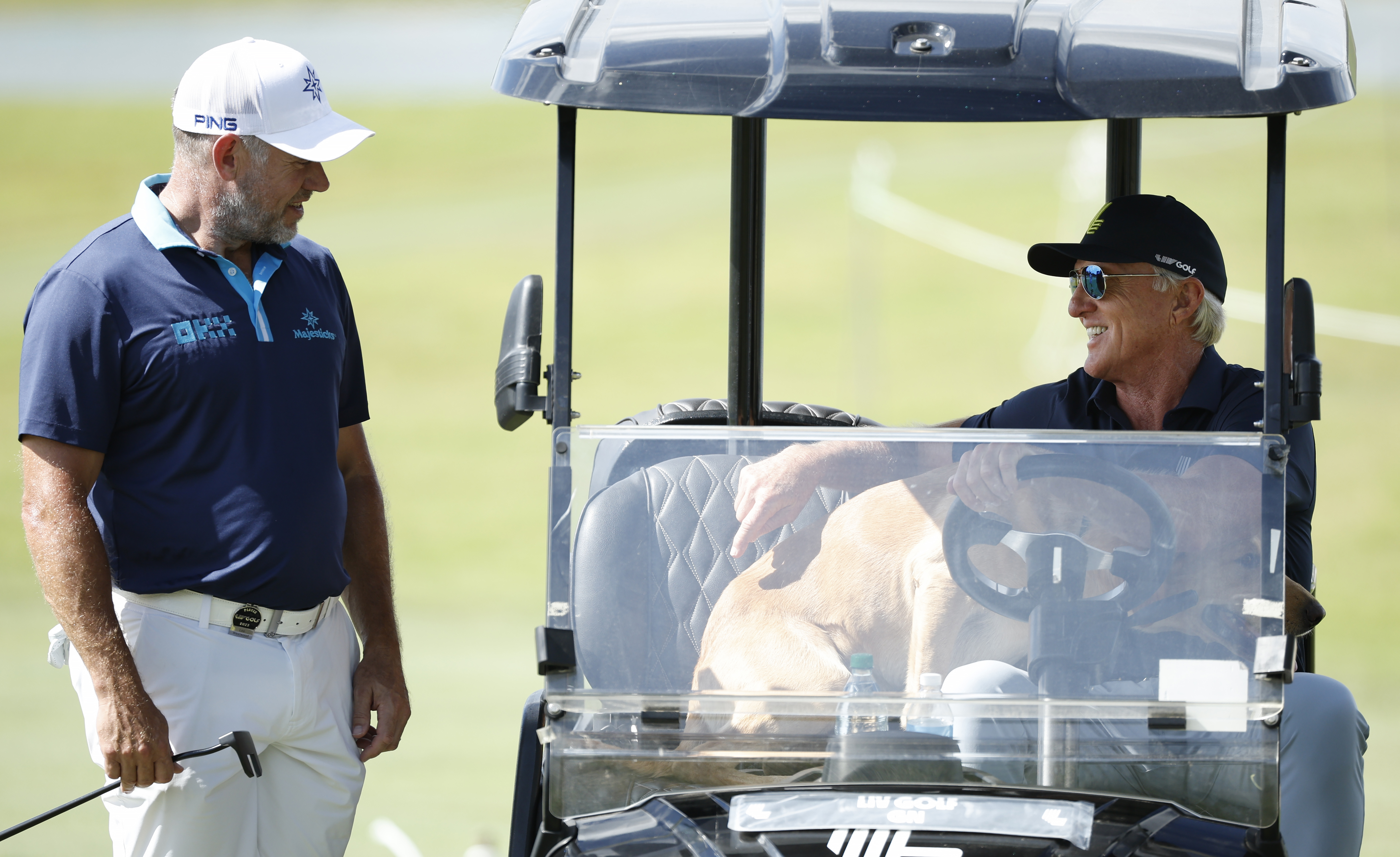 Lee Westwood and Greg Norman chat
