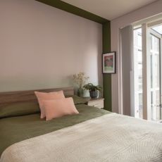 green bedroom with ombre wall 