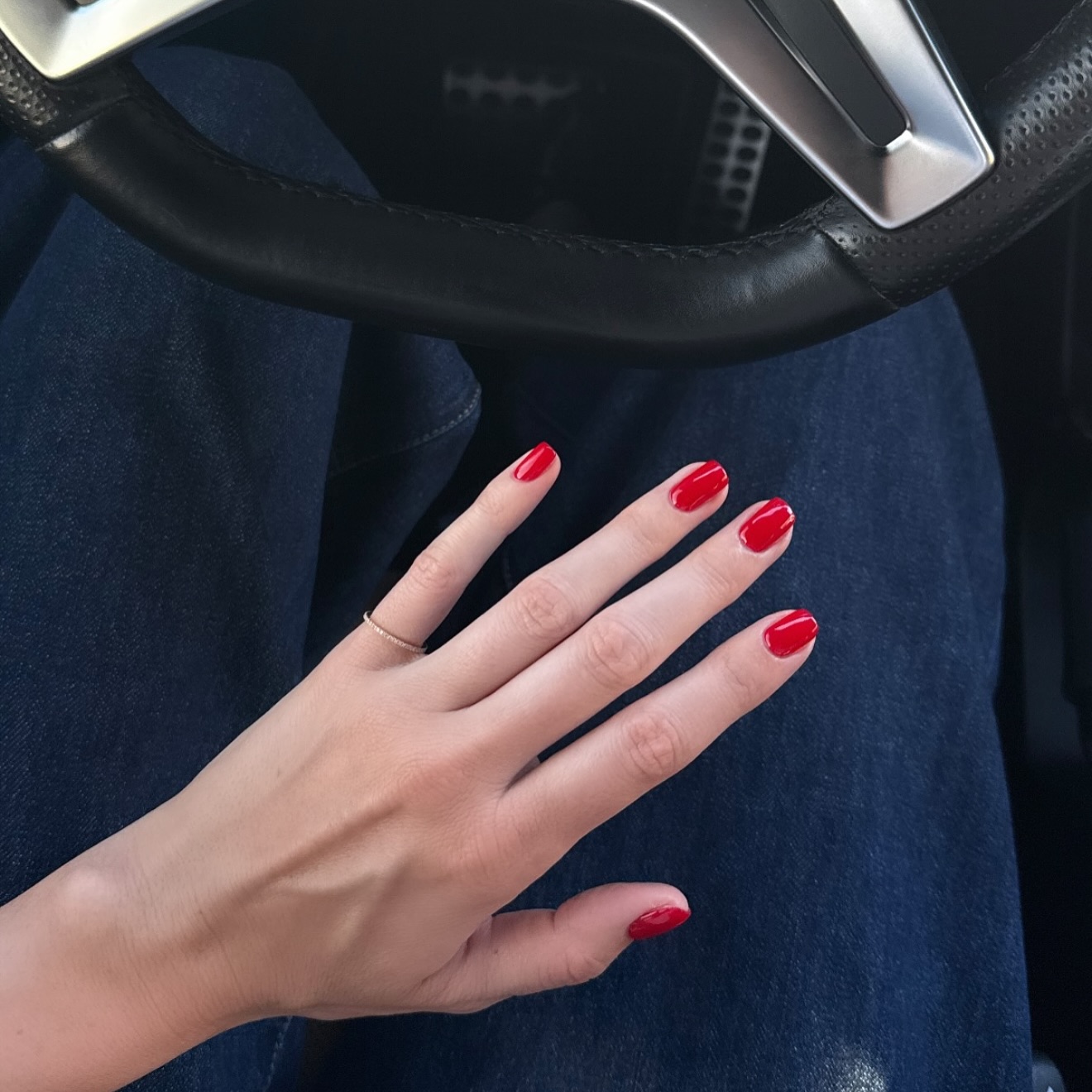 Kendall Jenner wearing OPI Big Apple Red