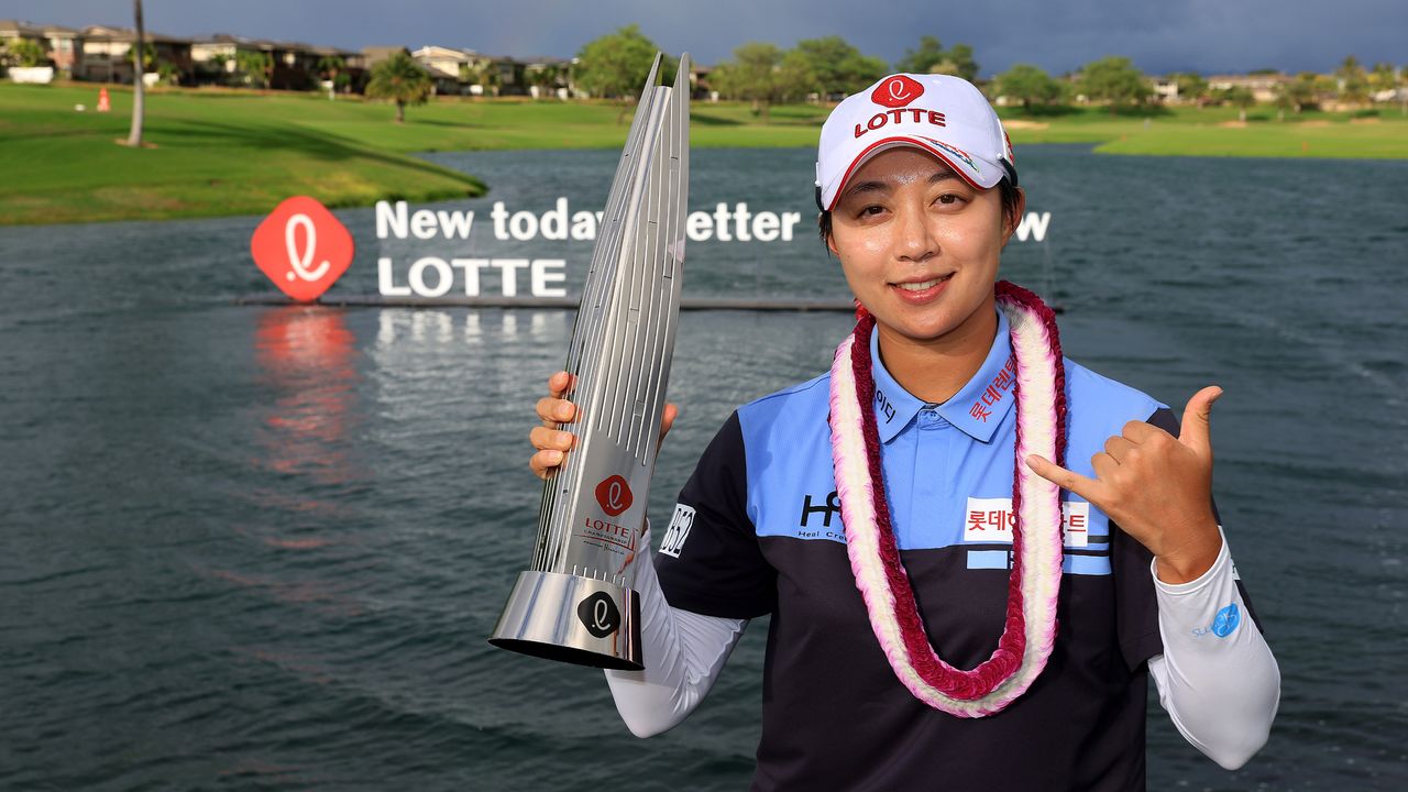 Hyo-Joo Kim with the trophy after her win in the 2022 Lotte Championship at Hoakalei Country Club in Hawaii