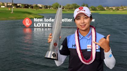 Hyo-Joo Kim with the trophy after her win in the 2022 Lotte Championship at Hoakalei Country Club in Hawaii