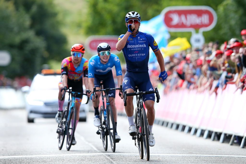 EDINBURGH SCOTLAND SEPTEMBER 11 Yves Lampaert of Belgium and Team Deceuninck QuickStep celebrates at finish line as stage winner ahead of Matteo Jorgenson of United States and Movistar Team and Matthew Gibson of United Kingdom and Team Ribble Weldtite Pro Cycling during the 17th Tour of Britain 2021 Stage 7 a 1948km stage from Hawick to Edinburgh TourofBritain TourofBritain on September 11 2021 in Edinburgh Scotland Photo by Alex LiveseyGetty Images