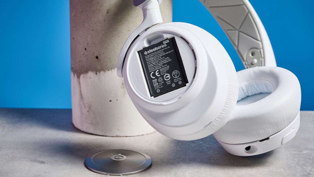 SteelSeries Arctis Nova Pro Wireless in white on a stone surface