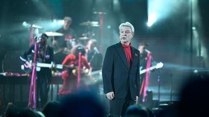 David Byrne performs at the SNL homecoming concert in February 2025.