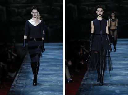 2 Models on runway wearing black skirt and dress, black knee high boots and elbow length gloves