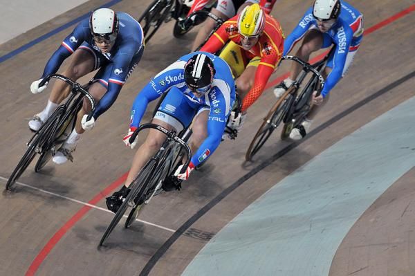 Fran&ccedil;ois Pervis (France) comes around Luca Ceci (Italy) to win his first round keirin heat.