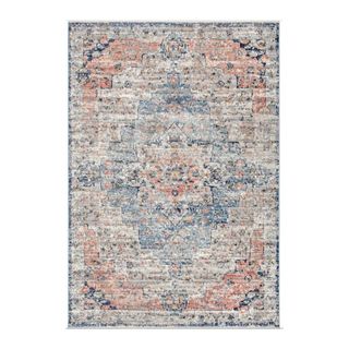 A blue and pink patterned area rug