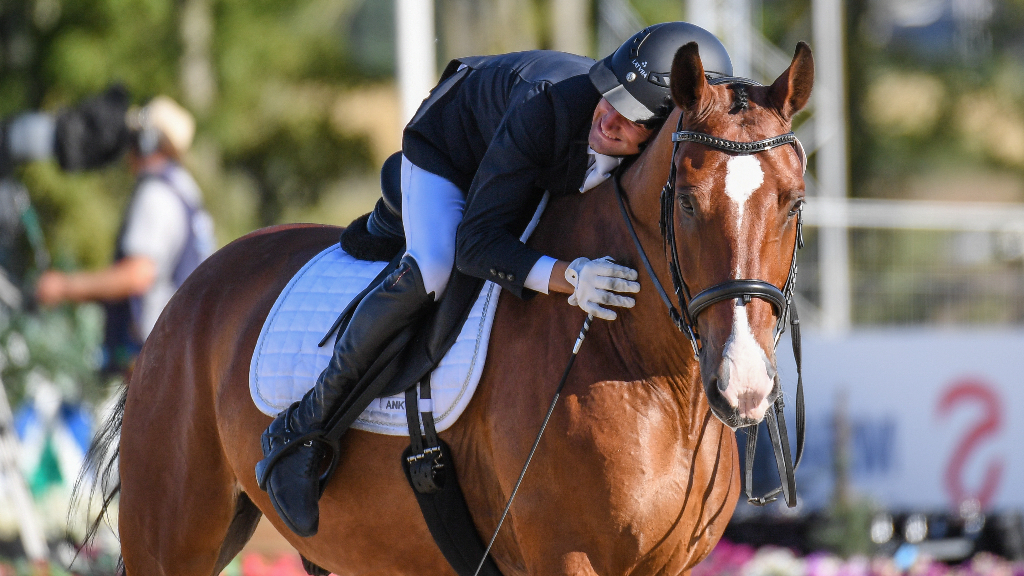 Latvia&amp;rsquo;s Rihards Snikus and King Of The Dance score a whopping 80.4% to head the grade I team test in the World Para Dressage Championships