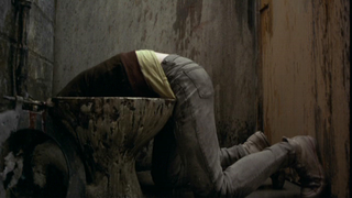 Renton reaching into the toilet in Trainspotting.