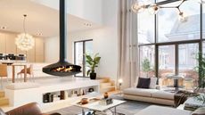 Gyrofocus Modern fireplace in an open plan kitchen living space by Focus Fireplaces