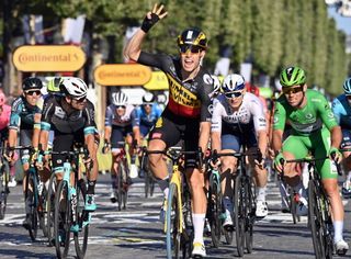 Belgian Wout Van Aert of Team JumboVisma celebrates as he crosses the finish line to win the 21 and last stage of the 108th edition of the Tour de France cycling race 1084 km from Chatou to Paris in France Sunday 18 July 2021 This years Tour de France takes place from 26 June to 18 July 2021BELGA PHOTO DAVID STOCKMAN Photo by DAVID STOCKMANBELGA MAGAFP via Getty Images