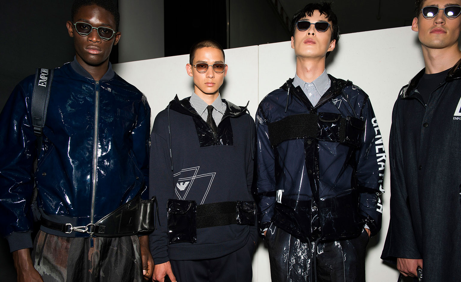 Backstage Emporio Armani S/S 2020 models wearing shiny fashion clothing