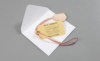 luggage tag from Louis Vuitton invitation