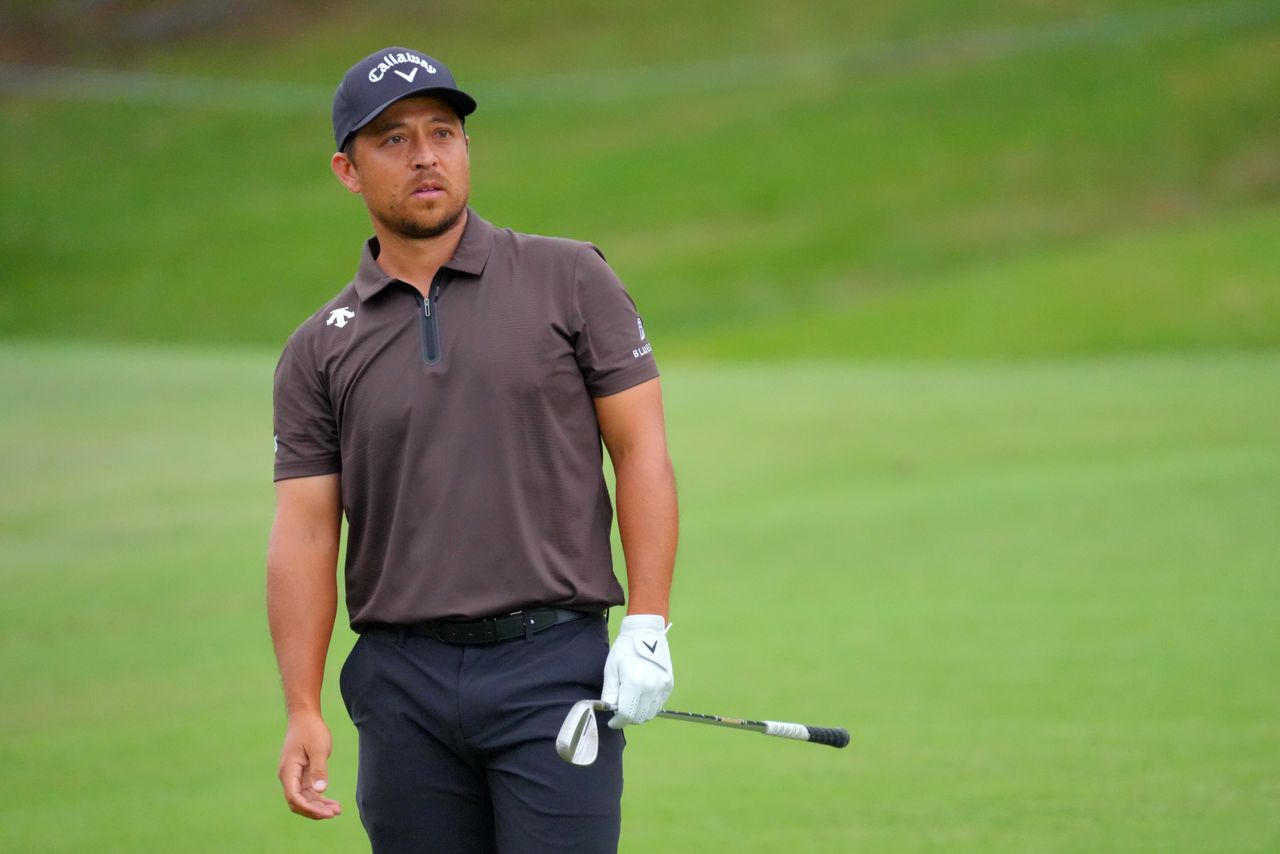 Xander Schauffele plays a wedge shot at the Baycurrent Classic in Japan