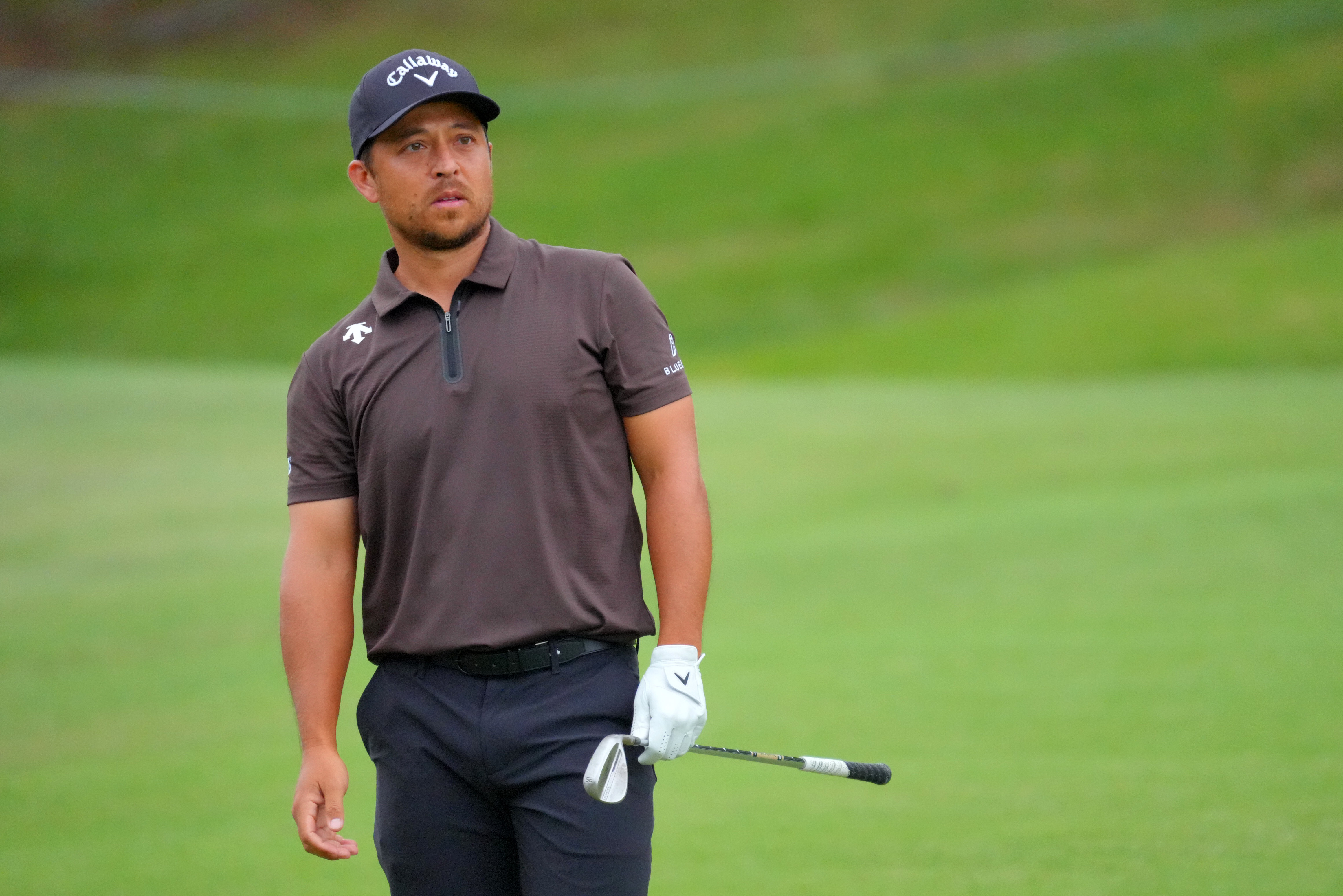 Xander Schauffele plays a wedge shot at the Baycurrent Classic in Japan