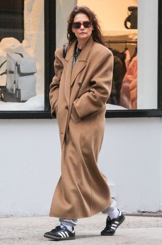Katie Holmes Adidas sneakers camel coat winter fashion