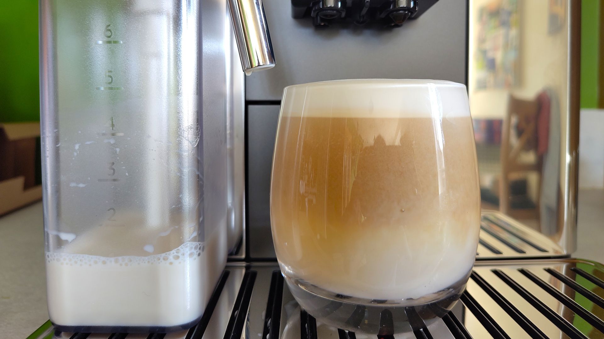 Iced latte macchiato made using Primadonna Aromatic coffee maker