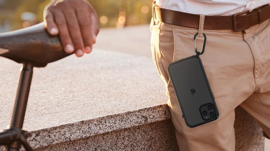 Catalyst Influence iPhone 12 Pro Max case attached to a man&#039;s belt