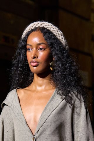 A model at Prabal Gurung wearing dewy skin, a key Fashion Week Autumn/Winter 25 beauty look