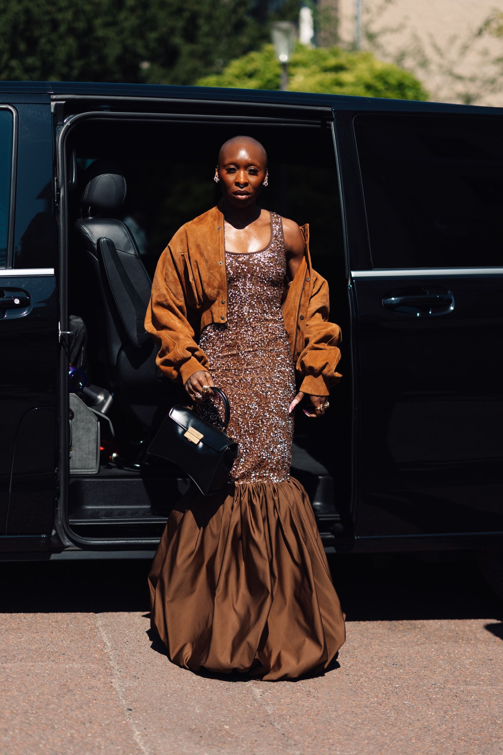 CYNTHIA ERIVO wears the balenciaga hourglass avenue bag.