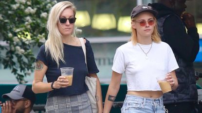 Kristen Stewart and Dylan Meyer walking down the street