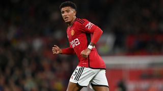 Jadon Sancho of Manchester United jogs during a match