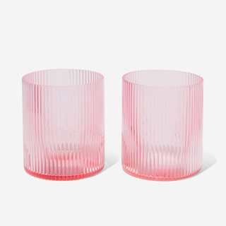 Two pink low ball glasses