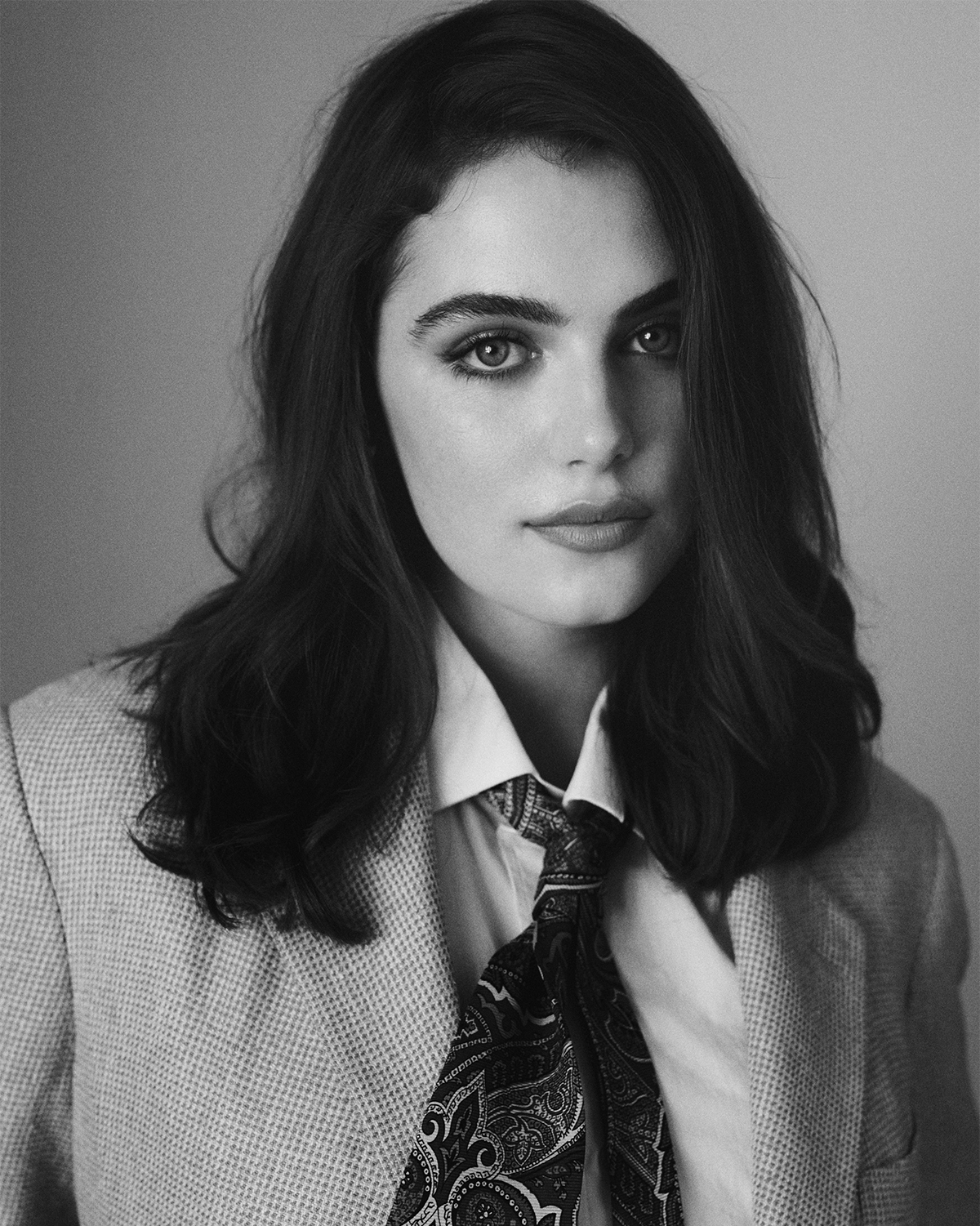 Ella Bright photographed by Zackery Michael for Who What Wear wearing a Ralph Lauren suit with paisley tie and Jenny Bird hoop earrings.