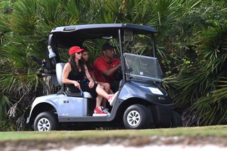Tiger Woods Drives Golf Cart