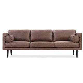 A dark brown Kardiel leather sofa for sustainable furniture brands.
