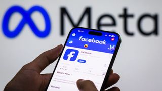 CHONGQING, CHINA - OCTOBER 30: In this photo illustration - The Facebook app page is displayed on a smartphone in the Apple App Store in front of the Meta Platforms, inc. logo on October 30, 2024 in Chongqing, China. (Photo by Cheng Xin/Getty Images)
