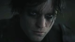 Robert Pattinson wearing black eye shadow in The Batman
