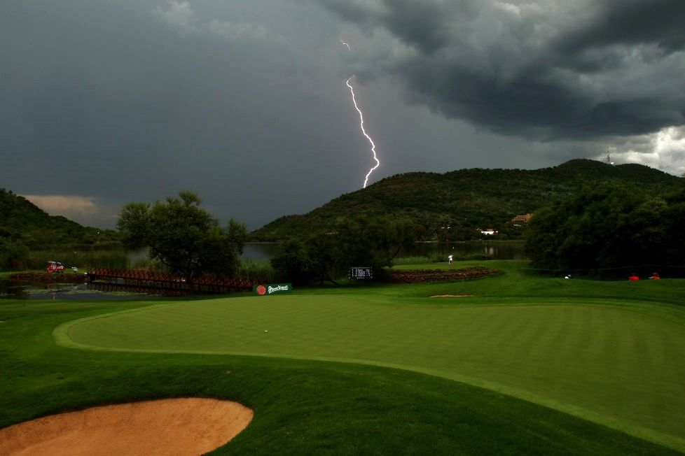 Lightning bolt over golf course GettyImages-83923218