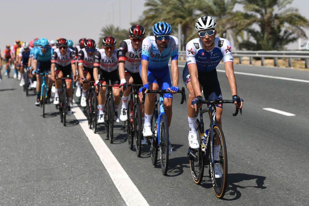 MADINAT ZAYED UNITED ARAB EMIRATES FEBRUARY 20 Ethan Vernon of United Kingdom and Team QuickStep Alpha Vinyl leads The Peloton during the 4th UAE Tour 2022 Stage 1 a 184km stage from Madinat Zayed to Madinat Zayed UAETour WorldTour on February 20 2022 in Madinat Zayed United Arab Emirates Photo by Tim de WaeleGetty Images