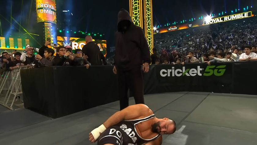 Bron Breakker getting attacked by a masked man at the Royal Rumble