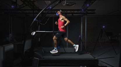 Athlete running on a treadmill in full Adidas gear