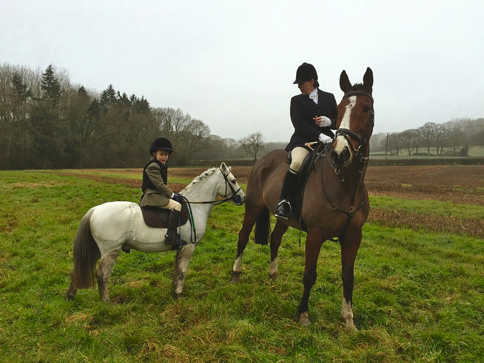 Antonia Camilleri and The Whiffler standing on point with a child riding a small grey pony