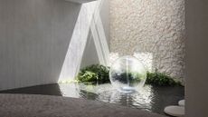 An outdoor pond with a fountain and vines growing around