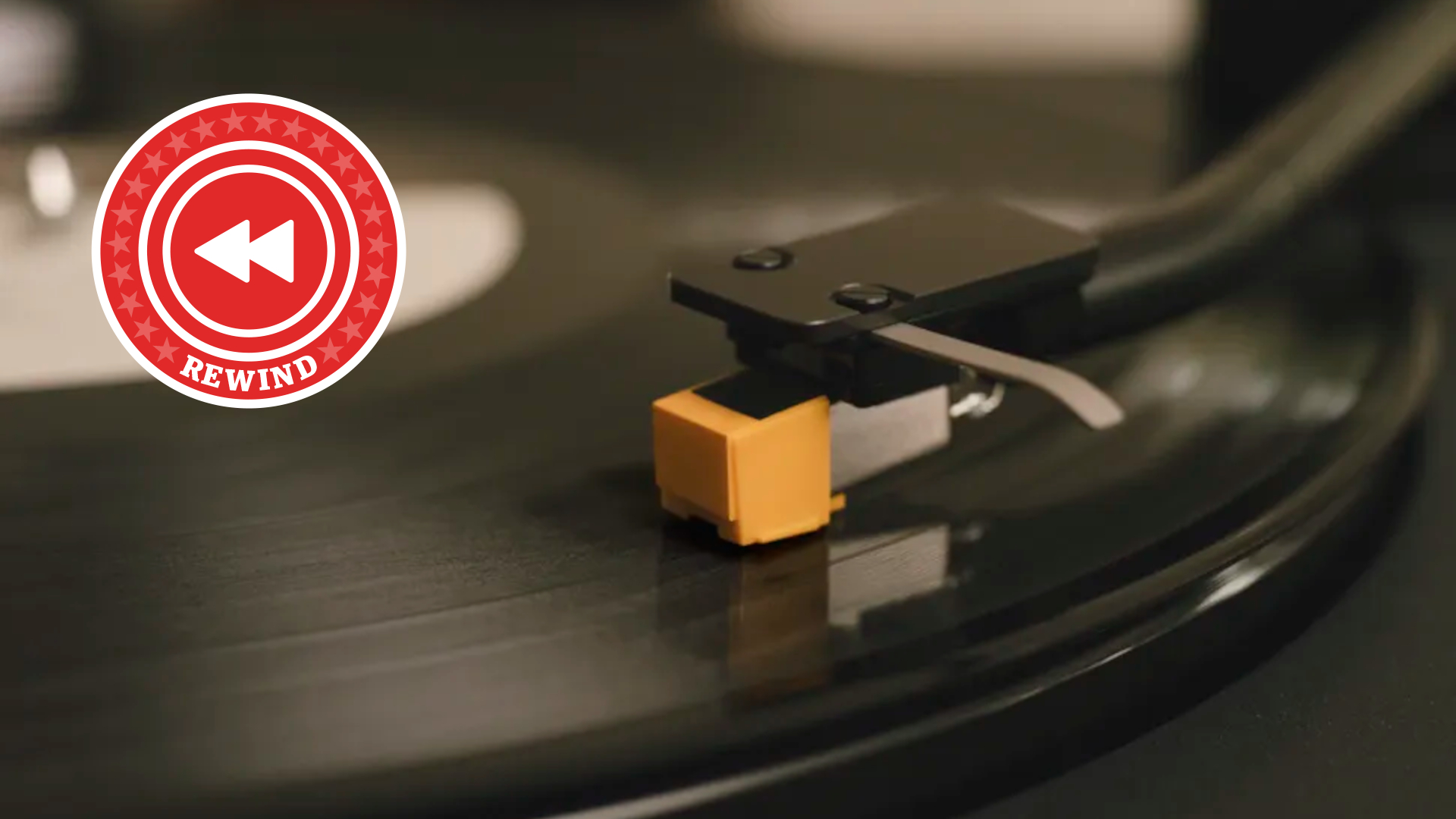 Rewind logo over turntable