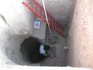 archaeologists at chogha golan, iran