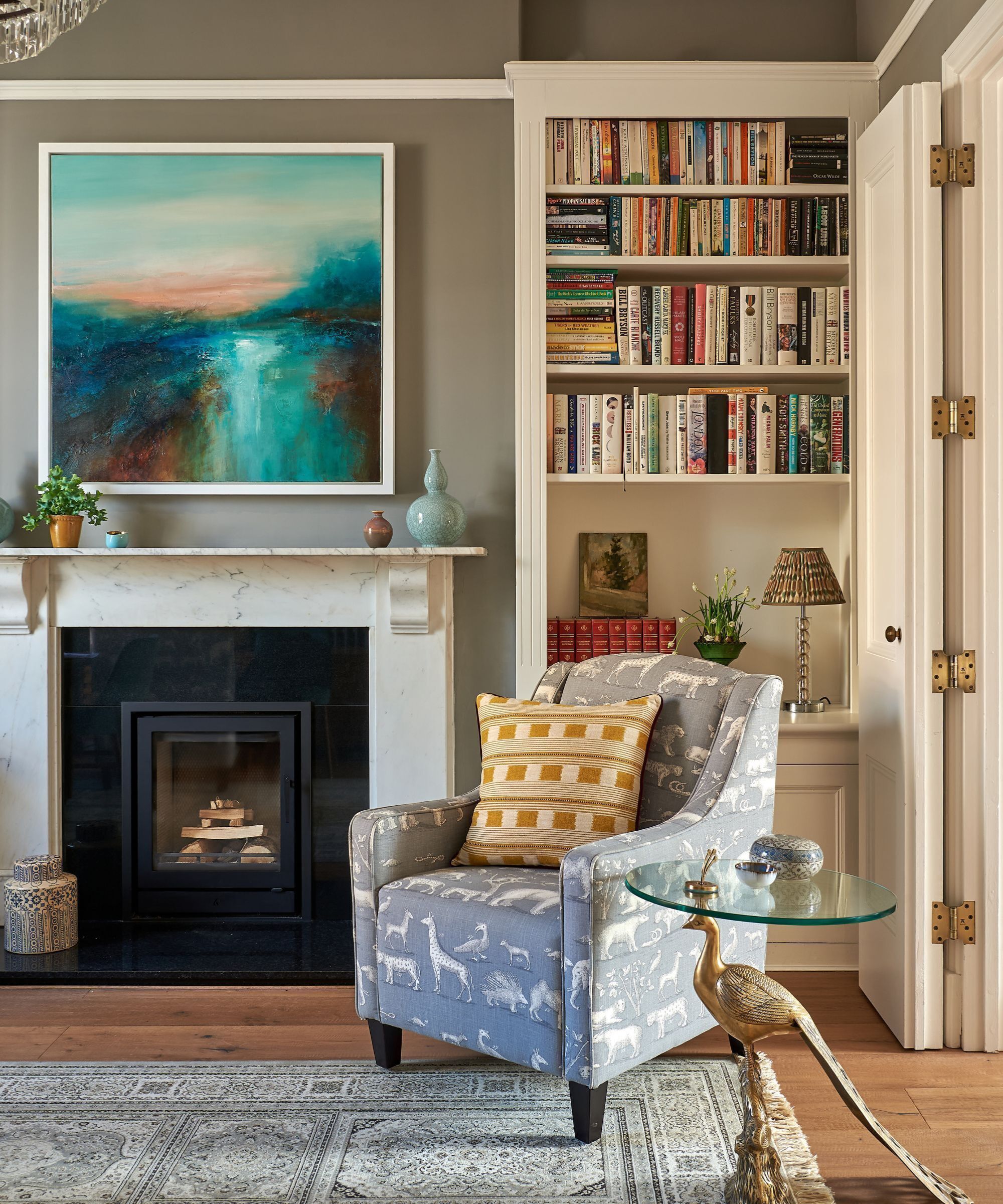 A sitting room painted in various shades of Portland stone by Little Greene