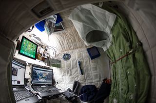 NASA astronaut Scott Kelly, who spent a year in space, shared this photo of his sleeping pod at the International Space Station.