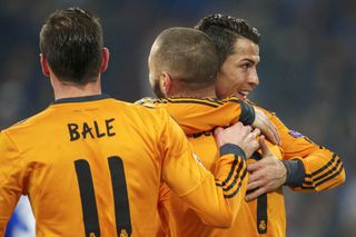 Cristiano Ronaldo, Karim Benzema and Gareth Bale celebrate a goal for Real Madrid against Schalke in the Champions League in February 2014.