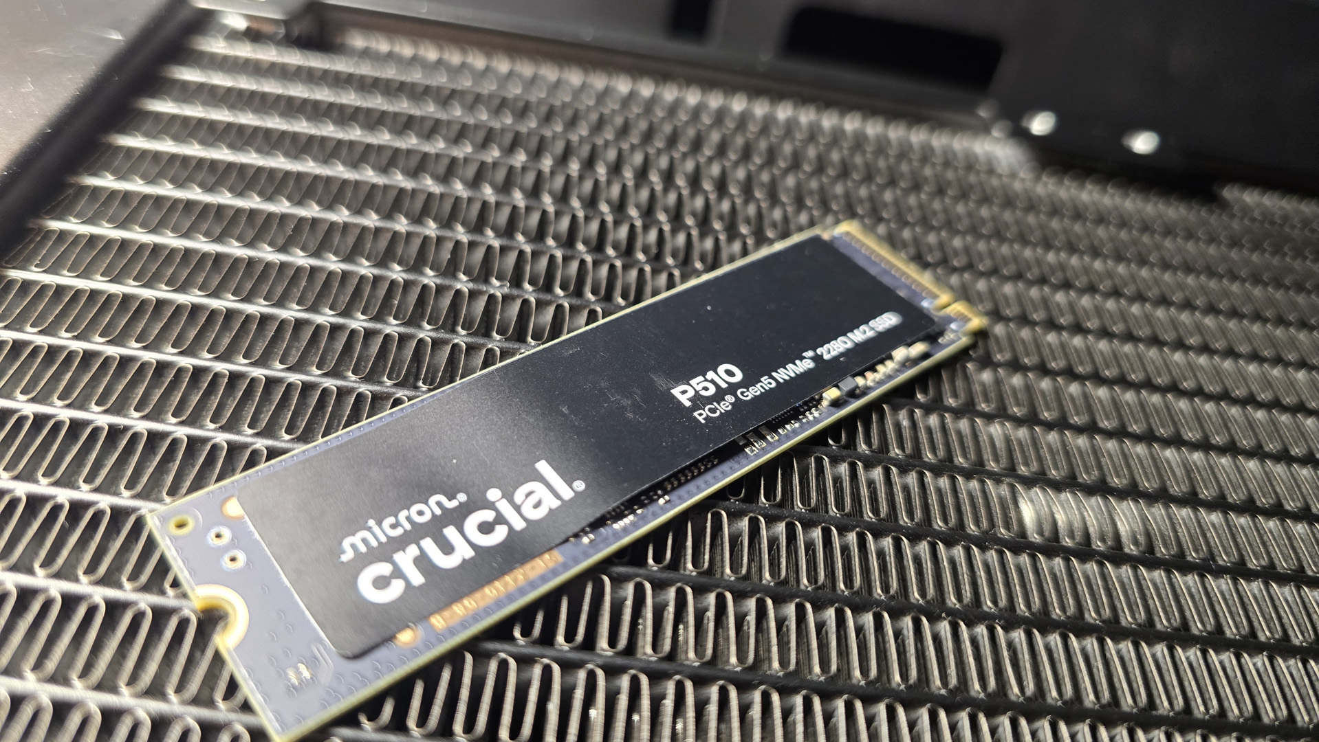 A Crucial P510 SSD installed in a gaming PC.