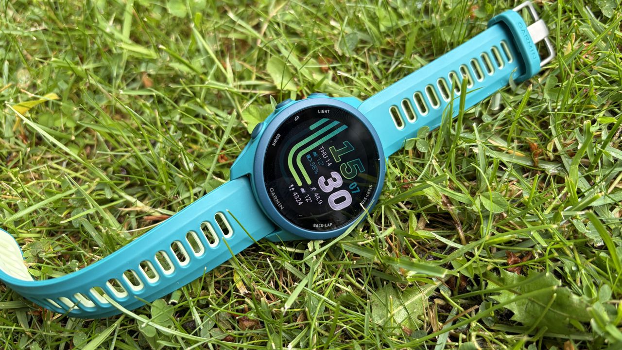 Garmin Forerunner 170 laid out on grass outside