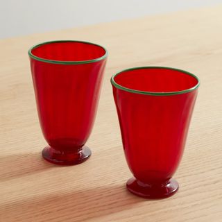 pair of bright red glasses with green trim