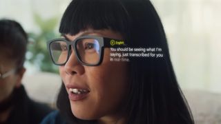 A woman wearing Google's AR translation glasses and seeing speech translated