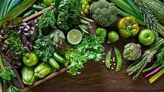Table top view background of a variation green vegetables for detox and alkaline diet